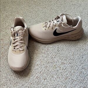 Nike Beige Sneakers with Black Swoosh